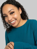 Insurance agent, property and casualty with a real or green shirt on. Angelique Young, clearsails operations